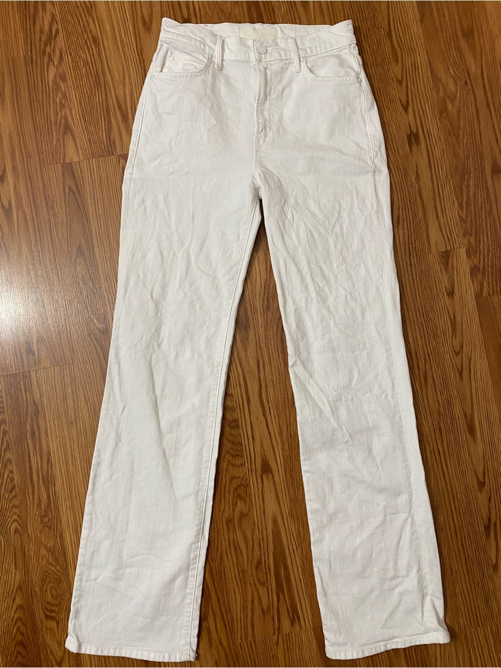 MOTHER White High-Rise Jeans. The kick it.